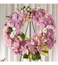 Gift of Warmth Wreath ™ FTD®. An arrangement by Grower Direct.