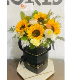 Golden Fields Bouquet. An arrangement by Geni's Florist and Gifts.