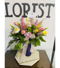 Lilac Dreams and Tulip Bliss. An arrangement by Geni's Florist and Gifts.