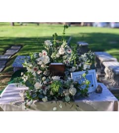 Serenity Garden Urn Spray. An arrangement by Ricky's Flowers and More.