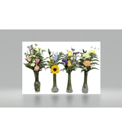 The Carrollwood Caress Budvase. An arrangement by Blumenladen Tampa Flower Shop.