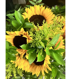 Thanksgiving sunshine. An arrangement by DMP Flowers and Gifts.