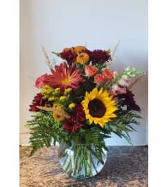Harvest Sunset Blooms. An arrangement by Zaisers Florist and Greenhouse.