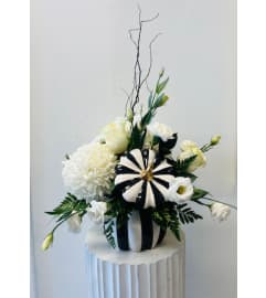 Monochrome Black and White Pumpkin. An arrangement by Marianna's Flower Island.