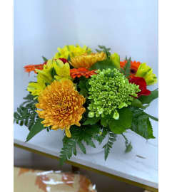 Vibrant Autumn Charm. An arrangement by Roma James Gifts.