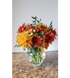 Radiant Fall Charm. An arrangement by Zaisers Florist and Greenhouse.