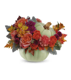 Bring autumn's charm. An arrangement by Flowers and Beyond.