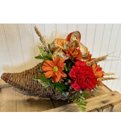 Horn of plenty. An arrangement by Flowers By Gerry.