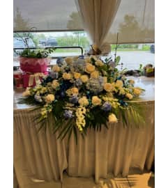 In Fondest Memory. An arrangement by Flamingo Floral and Gifts. In Fondest Memory. An arrangement by Flamingo Floral and Gifts.