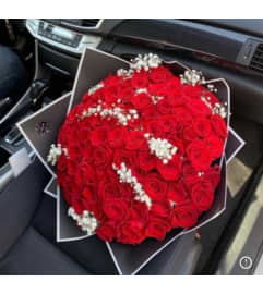 Love's Eternal Embrace. An arrangement by Charming Blooms.