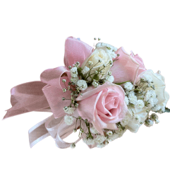 White and Pink Wrist Corsage. An arrangement by Colors Flowers and Gifts.