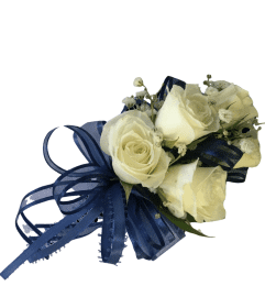 White Rose Wrist Corsage. An arrangement by Colors Flowers and Gifts. White Rose Wrist Corsage. An arrangement by Colors Flowers and Gifts.