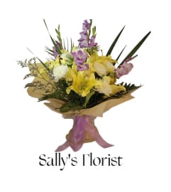 Sally's Tropical Sunrise Bouquet. An arrangement by Prime Florist.