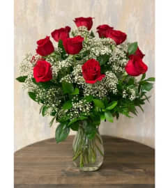 Dozen Long Stem Red Roses. An arrangement by Floral Fantasy.