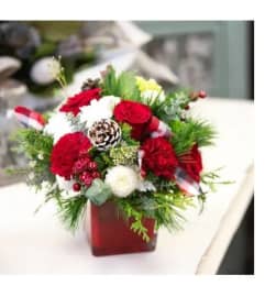 Christmas Hug. An arrangement by Loyalist Flowers.
