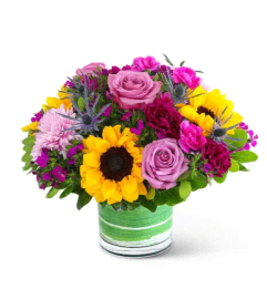 Luxe Amethyst Sunshine. An arrangement by The Flower Shop of Lake Charles.
