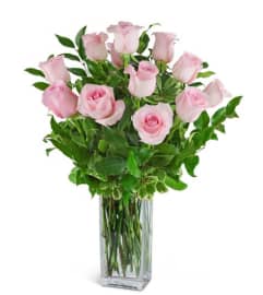 One Dozen Pink Roses. An arrangement by The Flower Shop of Lake Charles.