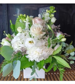 Garden of Grace. An arrangement by Howard Beach Florist.