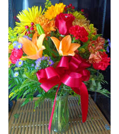 Autumn Sunset Bliss. An arrangement by Howard Beach Florist.