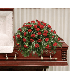 Red Carnation Casket Spray. An arrangement by Brooklin Floral and Garden Shoppe Inc..