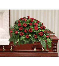 Red Rose Casket Spray. An arrangement by Brooklin Floral and Garden Shoppe Inc..
