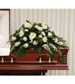 White Clouds Casket Spray. An arrangement by Brooklin Floral and Garden Shoppe Inc..