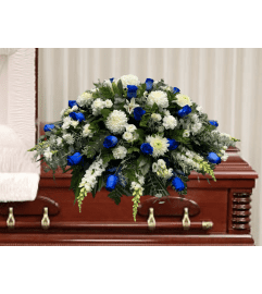 Faith Casket Spray. An arrangement by Brooklin Floral and Garden Shoppe Inc..