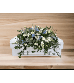 Children’s Casket Spray -Blue. An arrangement by Brooklin Floral and Garden Shoppe Inc..