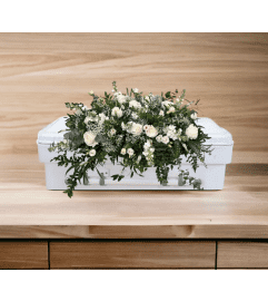 Children’s Casket Spray - White. An arrangement by Brooklin Floral and Garden Shoppe Inc..