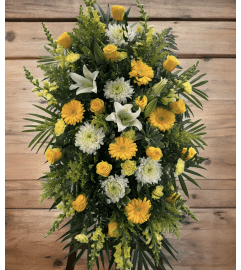 Sunshine Standing Spray. An arrangement by Brooklin Floral and Garden Shoppe Inc..
