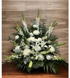 In The Clouds Tribute. An arrangement by Brooklin Floral and Garden Shoppe Inc..