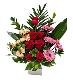 Sweet Gerbera Rose Charm. An arrangement by Garden Florist.