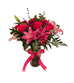 Soft Elegance: Pink Roses and Lilies Bouquet. An arrangement by La Bolsa Rosa.