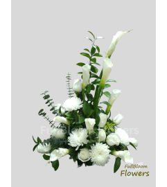Serene White Harmony. An arrangement by FullBloom Flowers.
