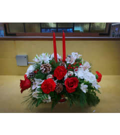 Christmas Centerpiece. An arrangement by Sun Valley Florist. Christmas Centerpiece. An arrangement by Sun Valley Florist.