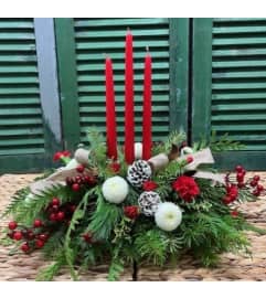 Winter Warmth Centerpiece. An arrangement by Forest Florist.