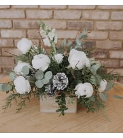 Frosted Elegance Centerpiece. An arrangement by Canmore Flowers by Alpine Blooms.