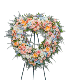 Meadow of Memories Heart. An arrangement by The Flower Shop of Lake Charles.