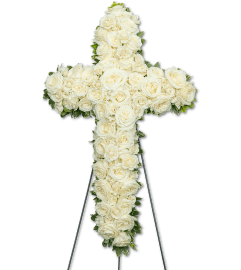 Pure Serenity Cross. An arrangement by The Flower Shop of Lake Charles.