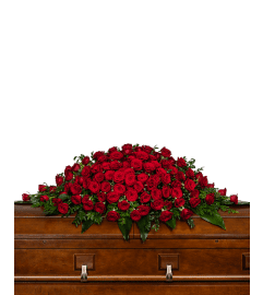 Everlasting Beauty Closed Casket Spray. An arrangement by The Flower Shop of Lake Charles.