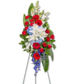 Stars and Stripes Forever Standing Spray. An arrangement by The Flower Shop of Lake Charles.
