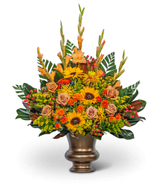 Sunset Serenade Urn. An arrangement by The Flower Shop of Lake Charles.