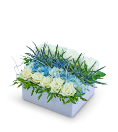 Ocean Love Pave. An arrangement by The Flower Shop of Lake Charles.