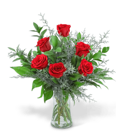 The Holiday Six. An arrangement by The Flower Shop of Lake Charles.