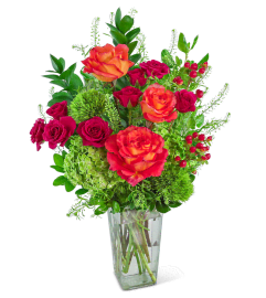 Samba Sunrise. An arrangement by The Flower Shop of Lake Charles.