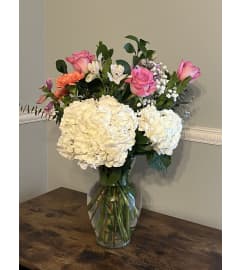 Blossoms of Serenity. An arrangement by Kelly Ann's Floral.