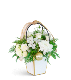 Yuletide Joy Tote. An arrangement by The Flower Shop of Lake Charles.