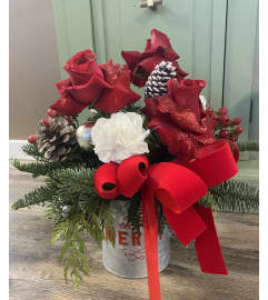 Merry Tin Arrangement. An arrangement by Selden Florist.