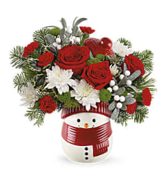 Teleflora's Snowman Wishes Bouquet. An arrangement by Sponseller's Flower Shop Inc.