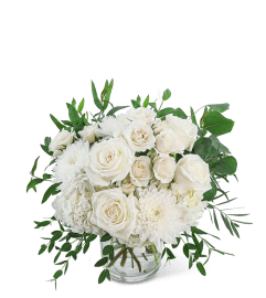 Blush Charm. An arrangement by The Flower Shop of Lake Charles.